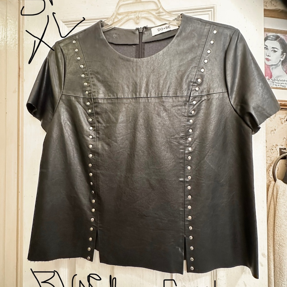 A Bada$$ Leather feel and look of a faux leatherstudded top in size XL